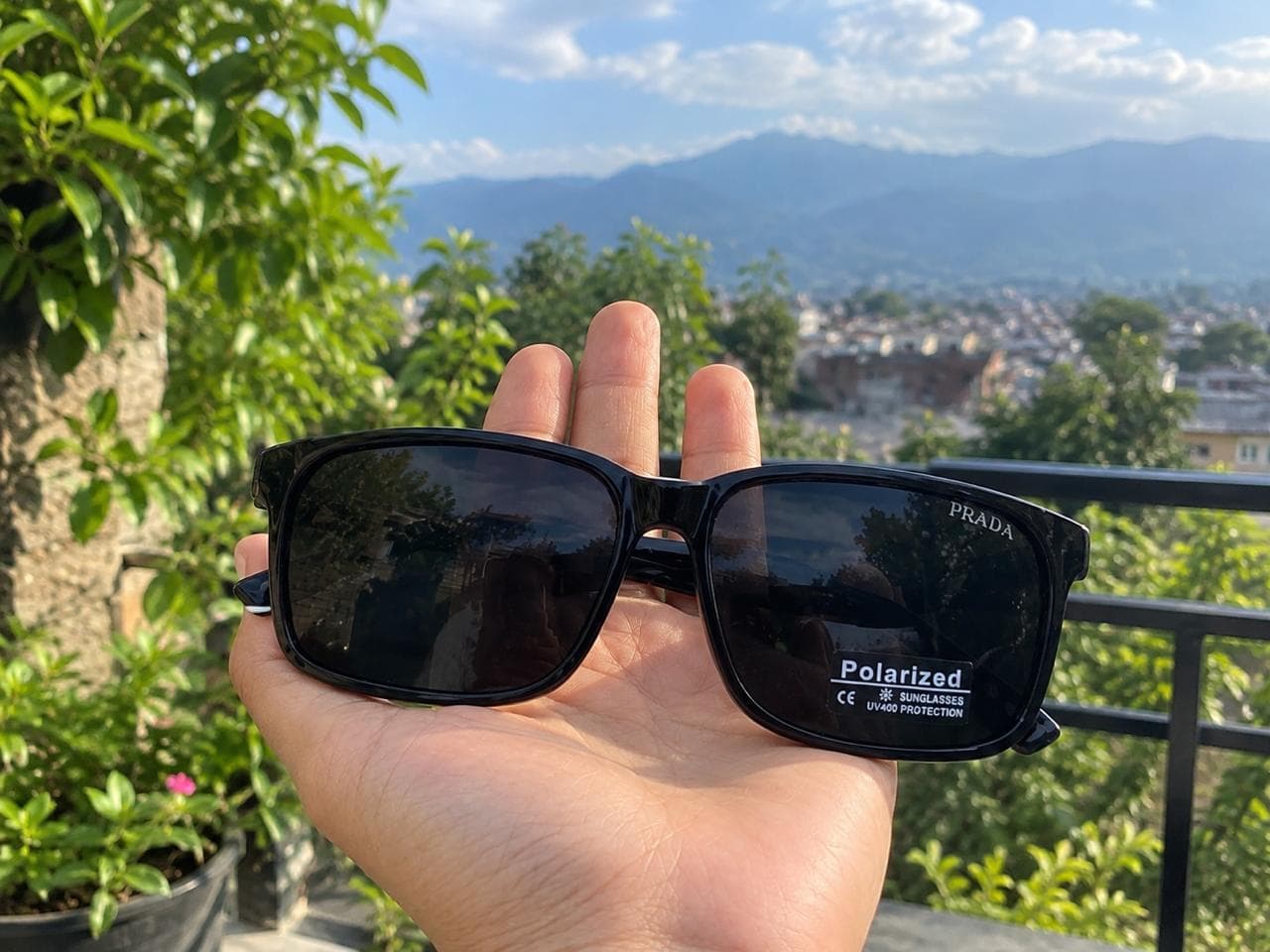 Black polarized sunglasses photographed in the optical shop